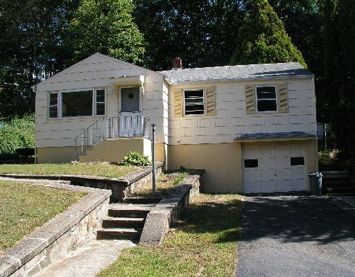 20 Charles Road Seymour, CT 06483 - Photo 1 of 1 a front view of a house with a yard