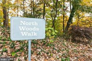 116 Cross Keys Road, Unit A A Baltimore, MD 21210 - Photo 15 of 15 a sign broad on the side of a road
