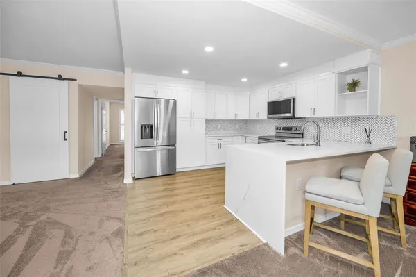 $148,400 | 1655 South Highland Avenue, Unit D241, Clearwater, FL 33756