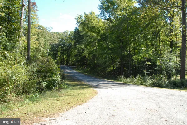 a view of swimming pool with a yard