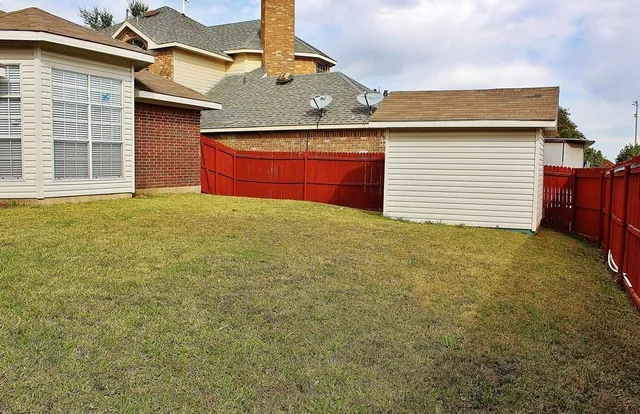 a view of outdoor space and yard