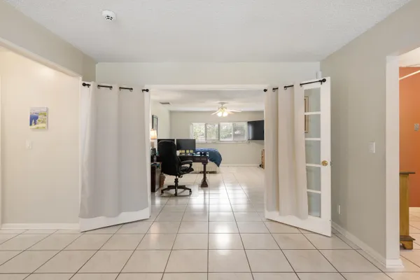 a view of kitchen with furniture and wooden floor