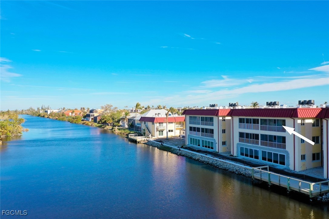 1610 Middle Gulf Drive, Unit D5 Sanibel, FL 33957 - Photo 12 of 47 an aerial view of residential houses with outdoor space