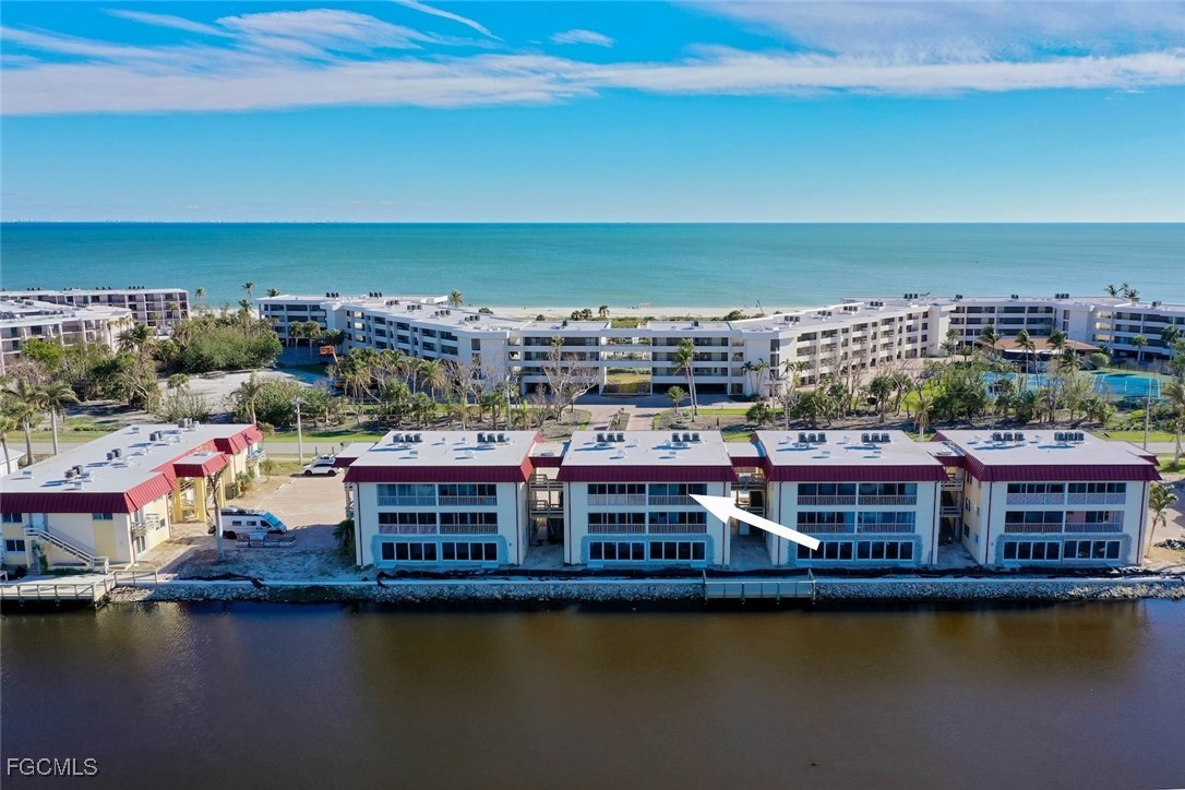 1610 Middle Gulf Drive, Unit D5 Sanibel, FL 33957 - Photo 2 of 47 a view of a city with a lake