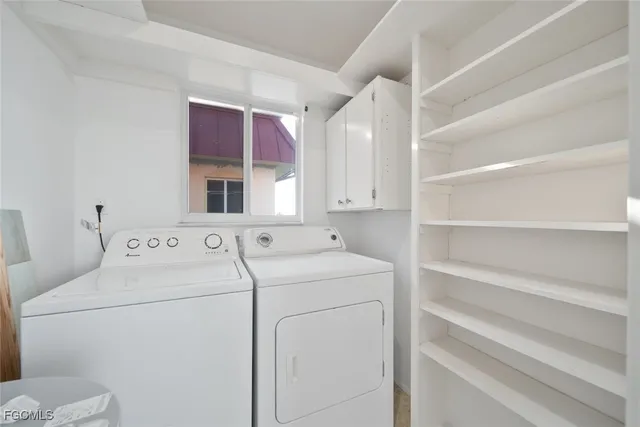 a view of a city with lawn chairs