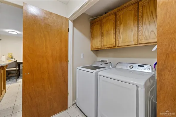 a kitchen with a stove and a microwave