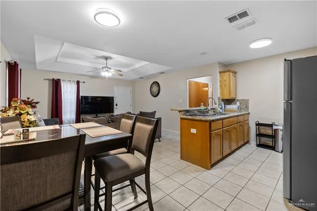 a view of a house with a street