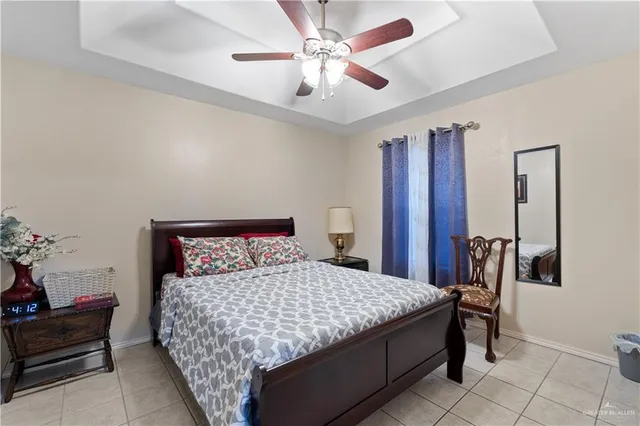 a view of kitchen with sink refrigerator and dining table