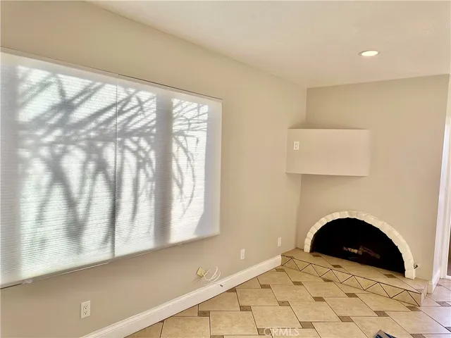 a view of empty room with windows