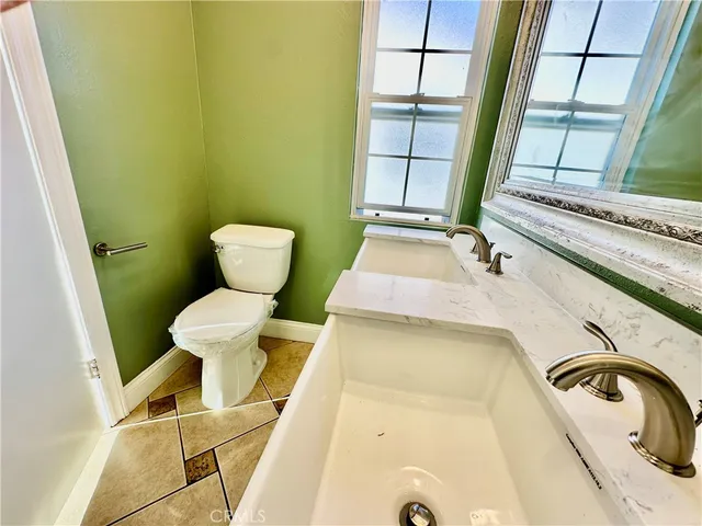 a bathroom with a sink and a toilet