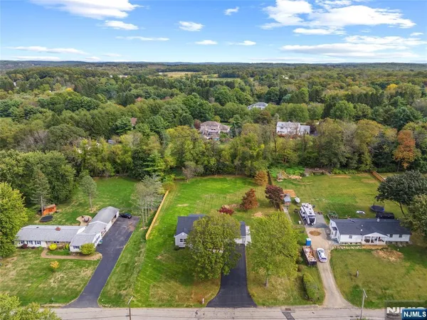 a view of a lake with a yard
