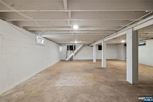 a view of room with kitchen