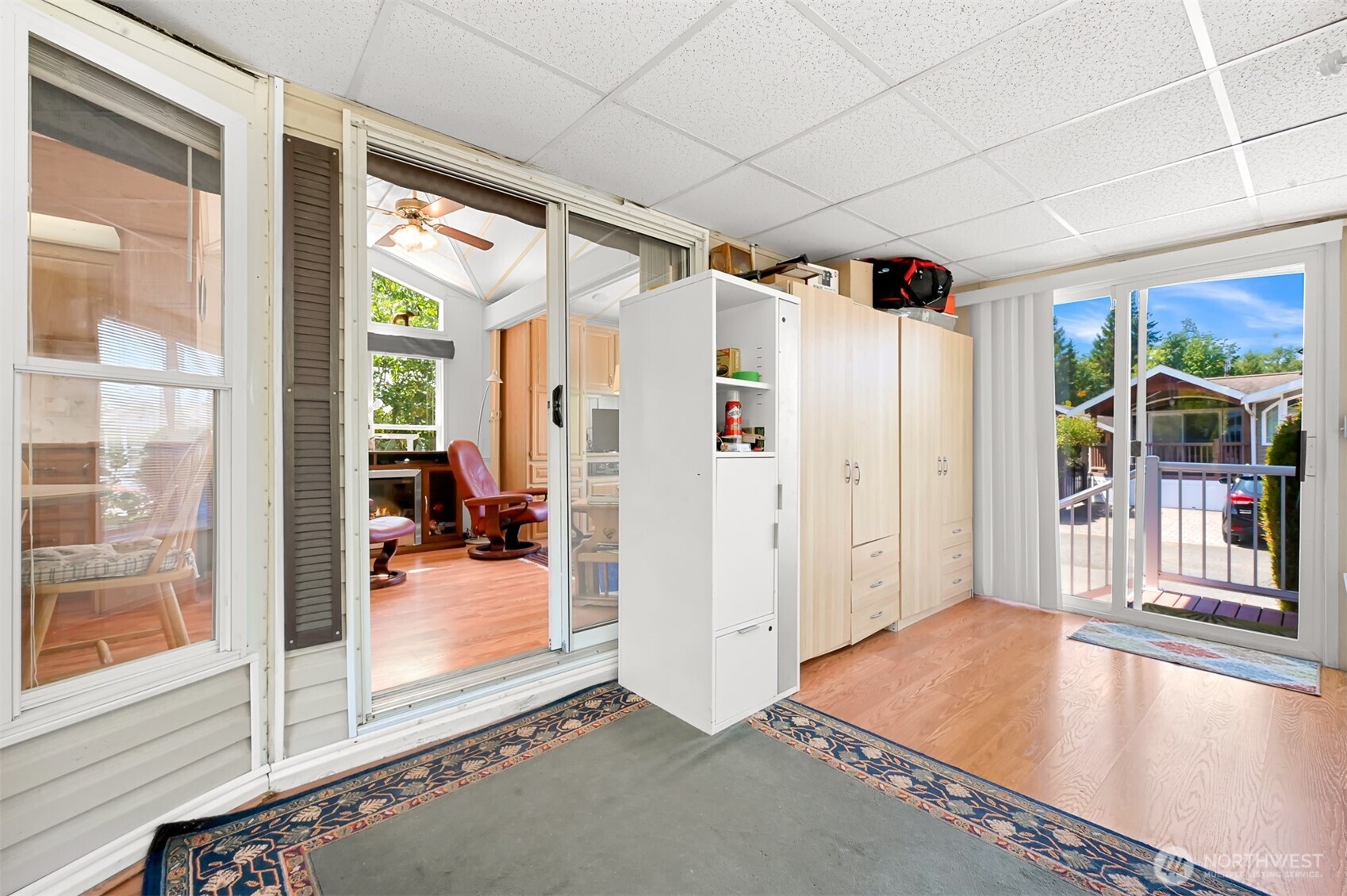 5001 Bay Road, Unit D134 Blaine, WA 98230 - Photo 12 of 32 a view of a big room with wooden floor and windows