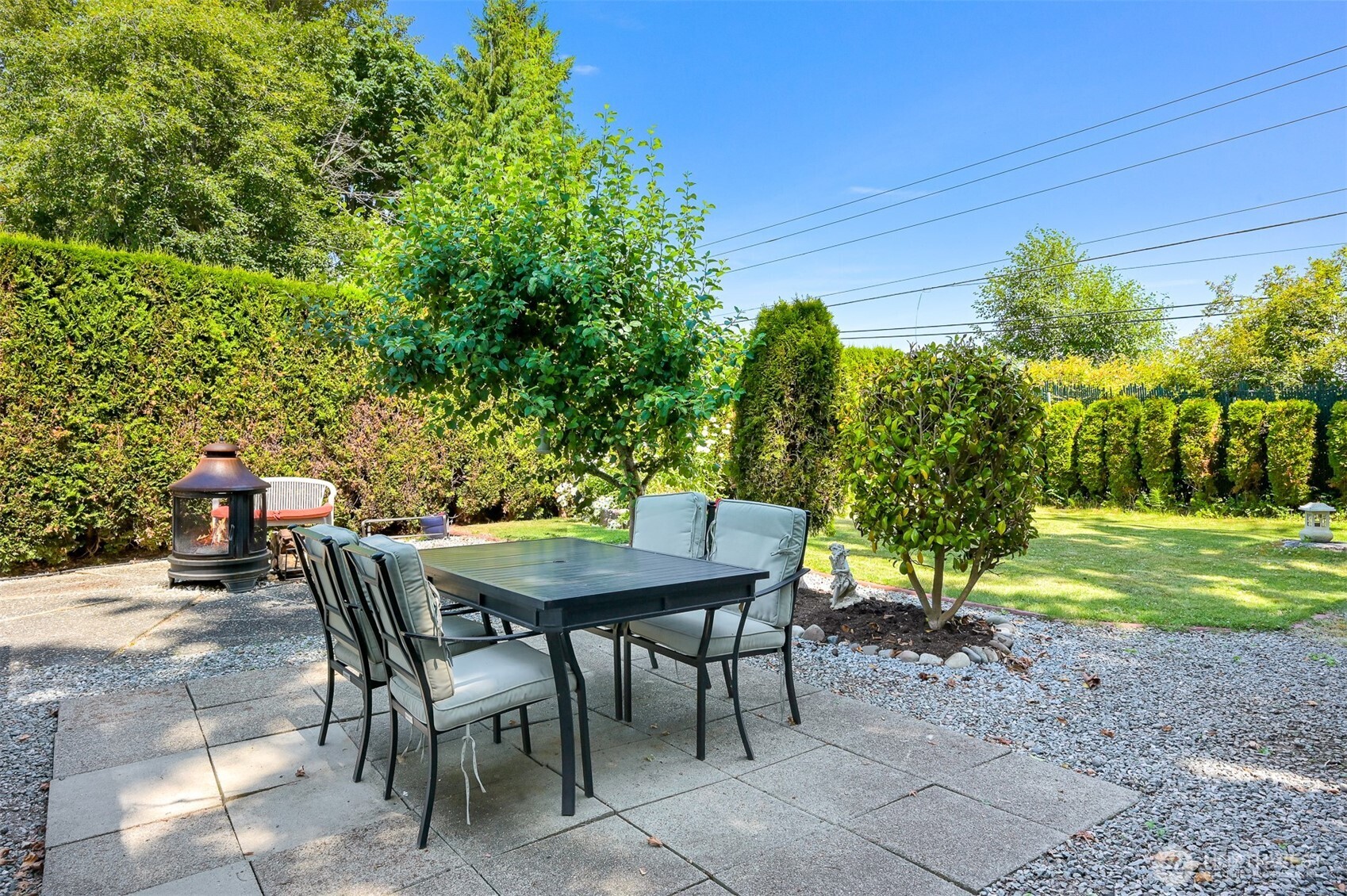 5001 Bay Road, Unit D134 Blaine, WA 98230 - Photo 15 of 32 a view of a backyard with furniture and a garden