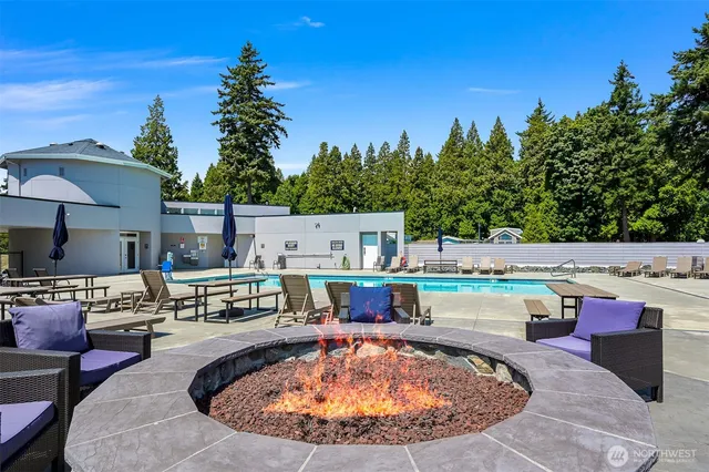 a view of a swimming pool with a patio