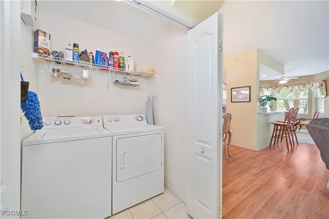 a utility room with dryer and washer