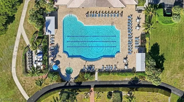 a view of swimming pool with a patio