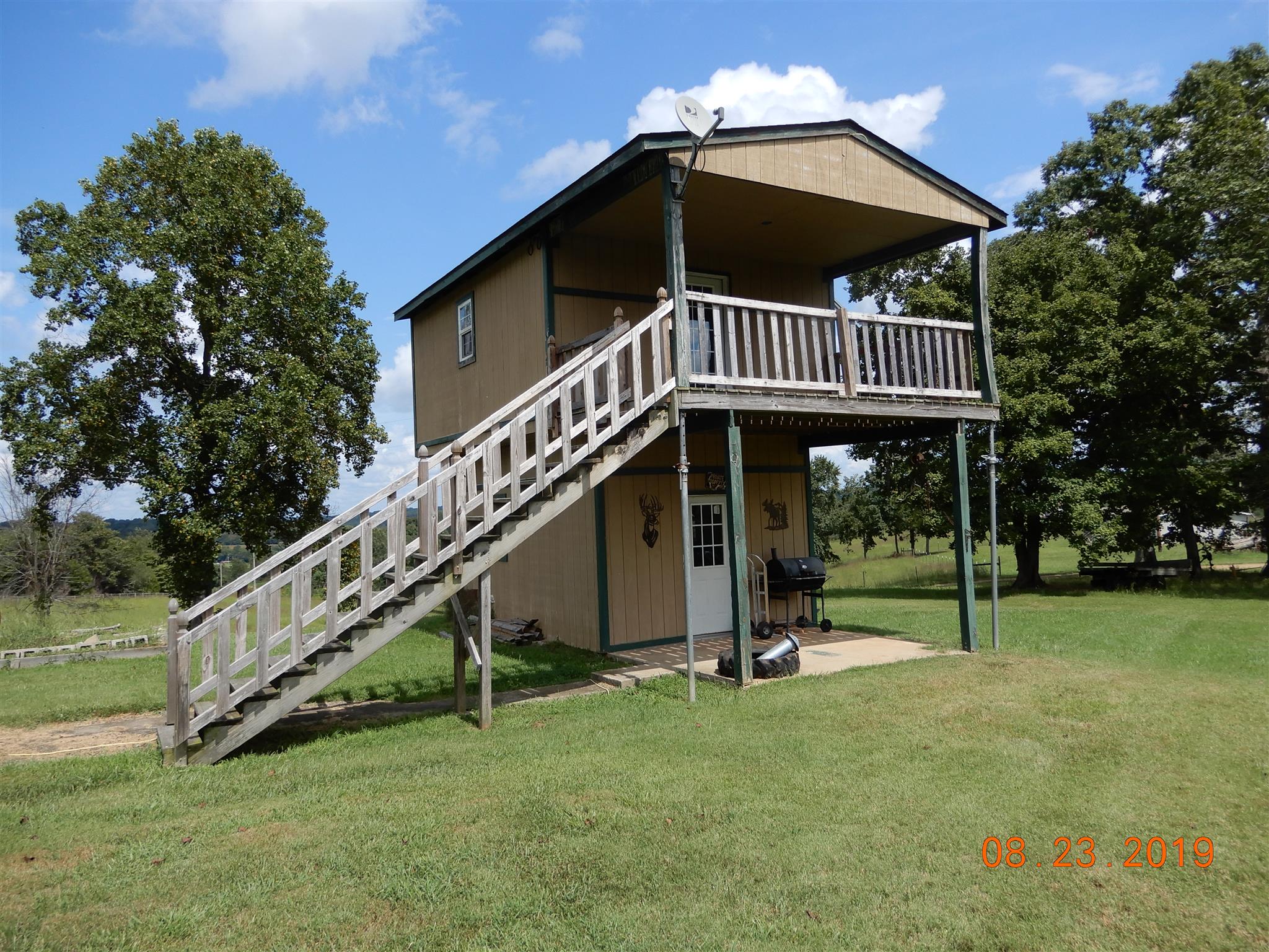211 Talmo Road Cumberland Furnace, TN 37051 - Photo 14 of 26 storage building with patio and upper deck for panoramic countryside views