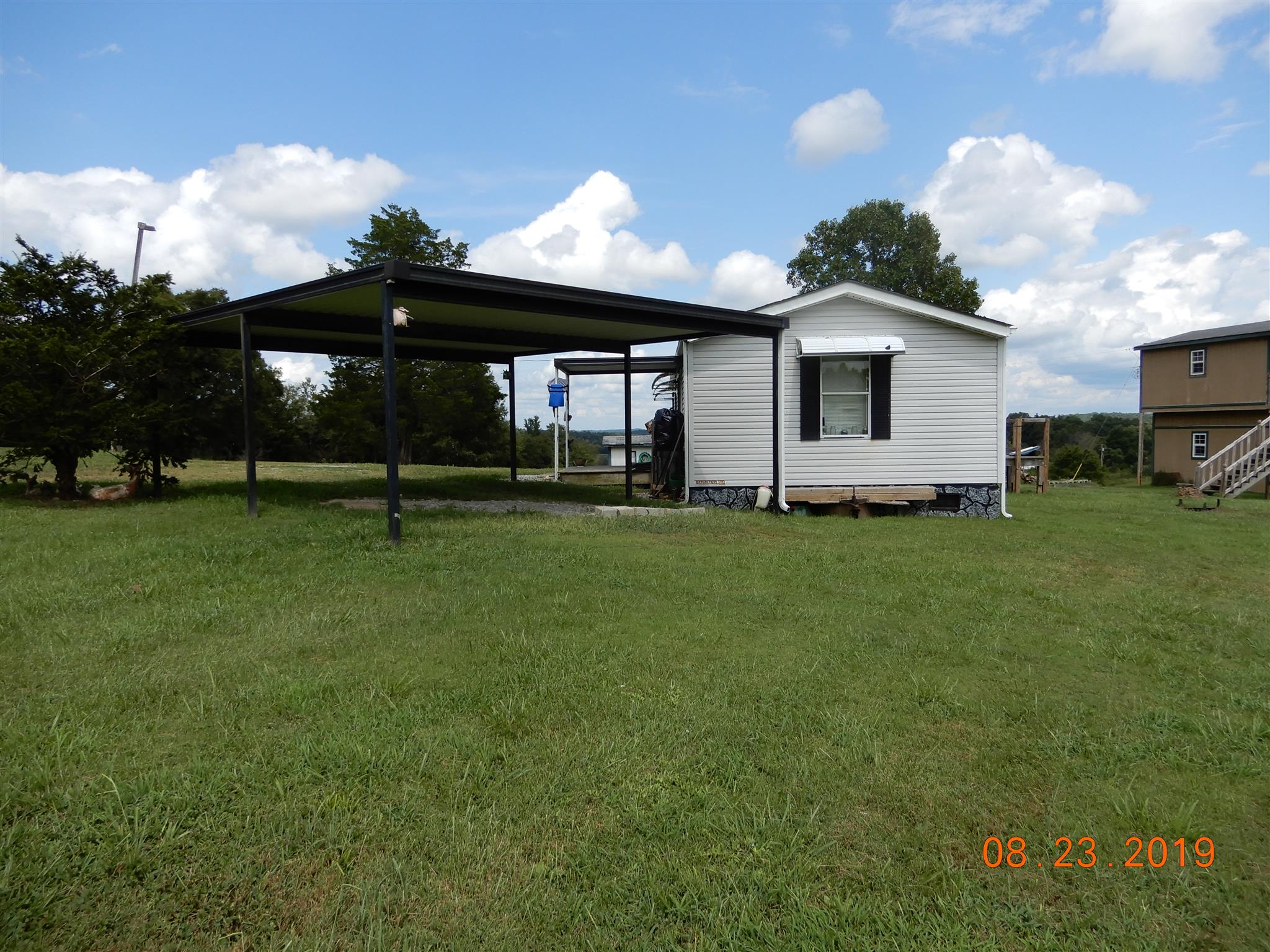 211 Talmo Road Cumberland Furnace, TN 37051 - Photo 18 of 26 car port and trailer