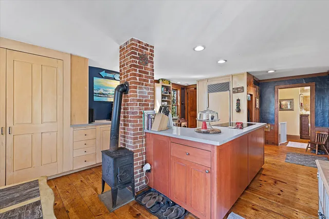 a kitchen with stainless steel appliances granite countertop a sink and cabinets
