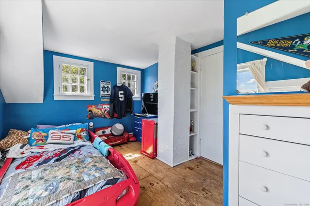 a bed room with a bed and a bed