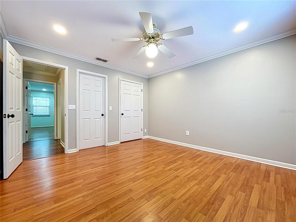 10655 Lakeview Drive New Port Richey, FL 34654 - Photo 43 of 83 wooden floor in an empty room with a window
