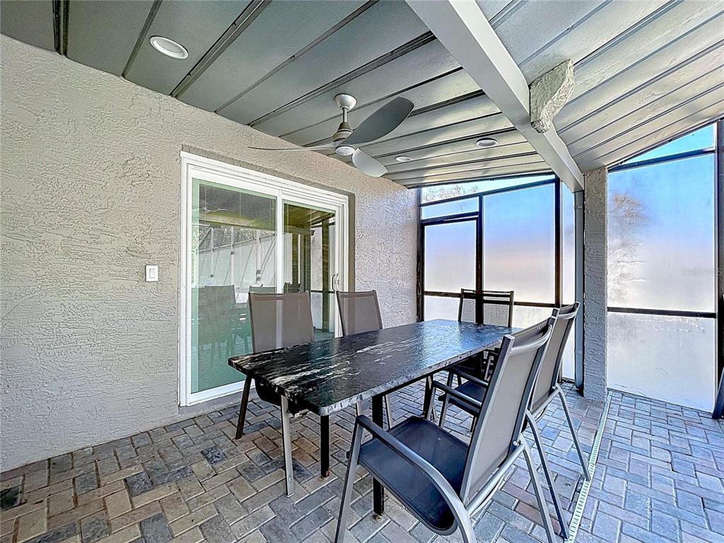 10655 Lakeview Drive New Port Richey, FL 34654 - Photo 58 of 83 a dining room with furniture and a window