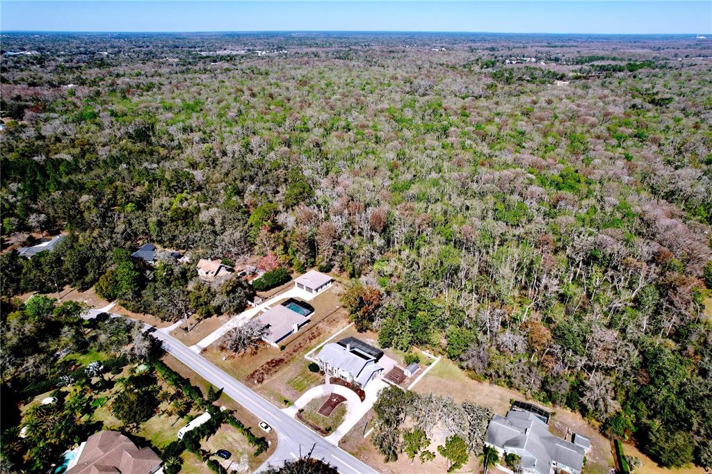 10655 Lakeview Drive New Port Richey, FL 34654 - Photo 82 of 83 an aerial view of a city with lots of residential buildings