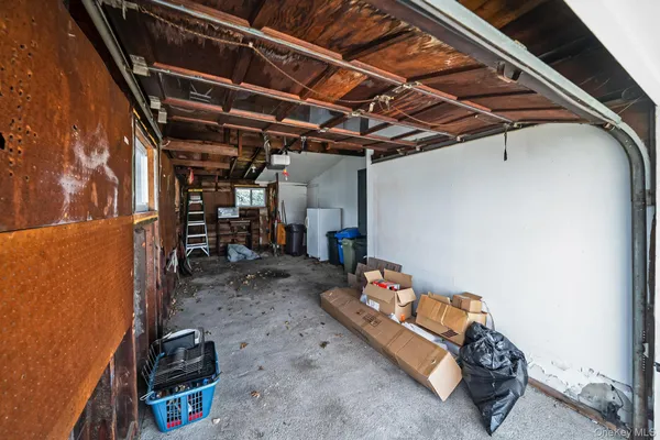a wooden bench sitting on top of a wooden floor