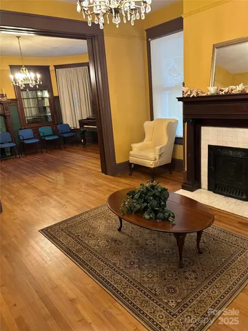 a living room with a couch and a fireplace