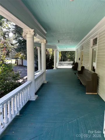 a view of a porch with furniture