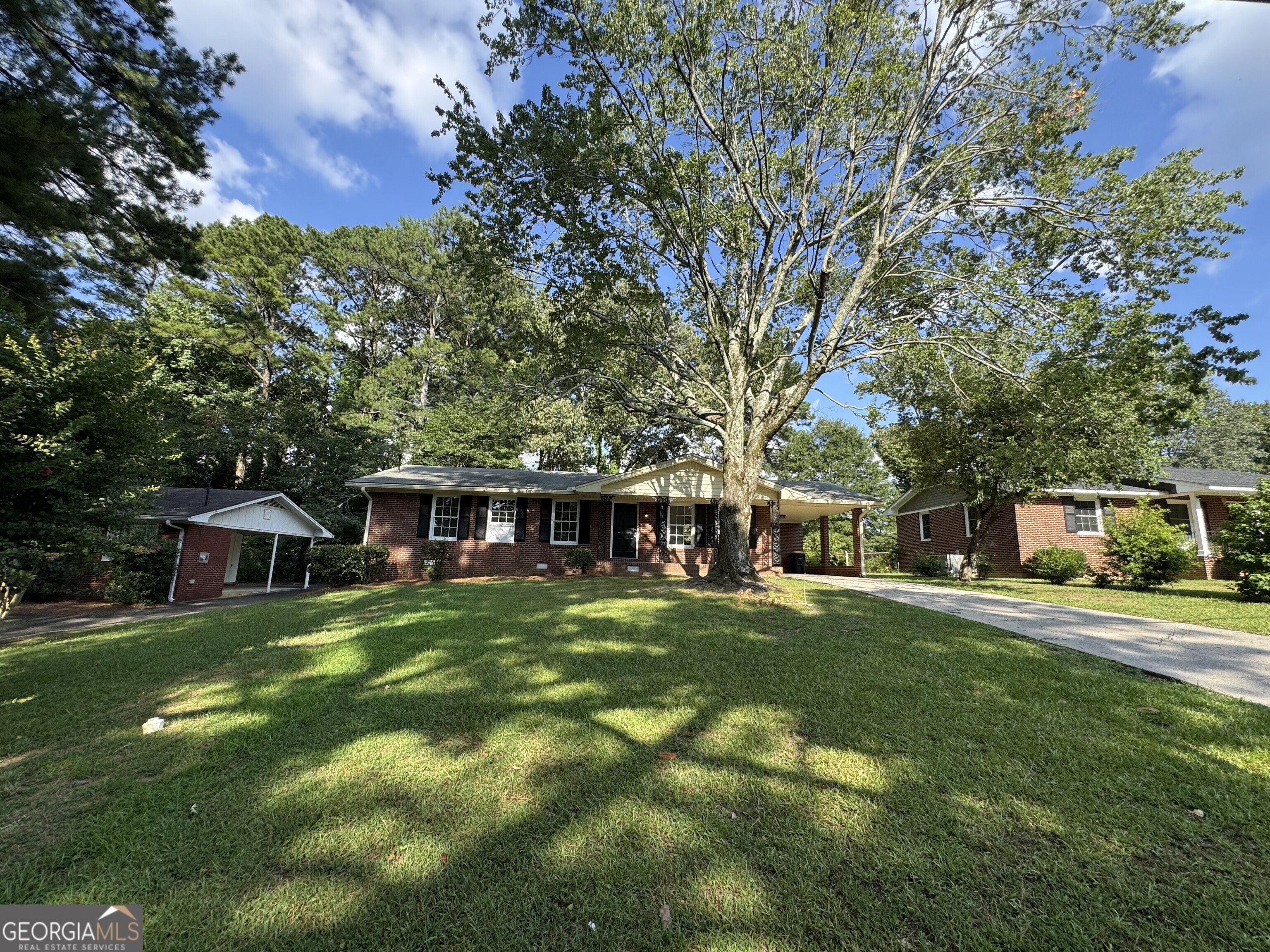 5 Ridge Drive Southwest Rome, GA 30165 - Photo 1 of 1 a front view of house with yard and green space