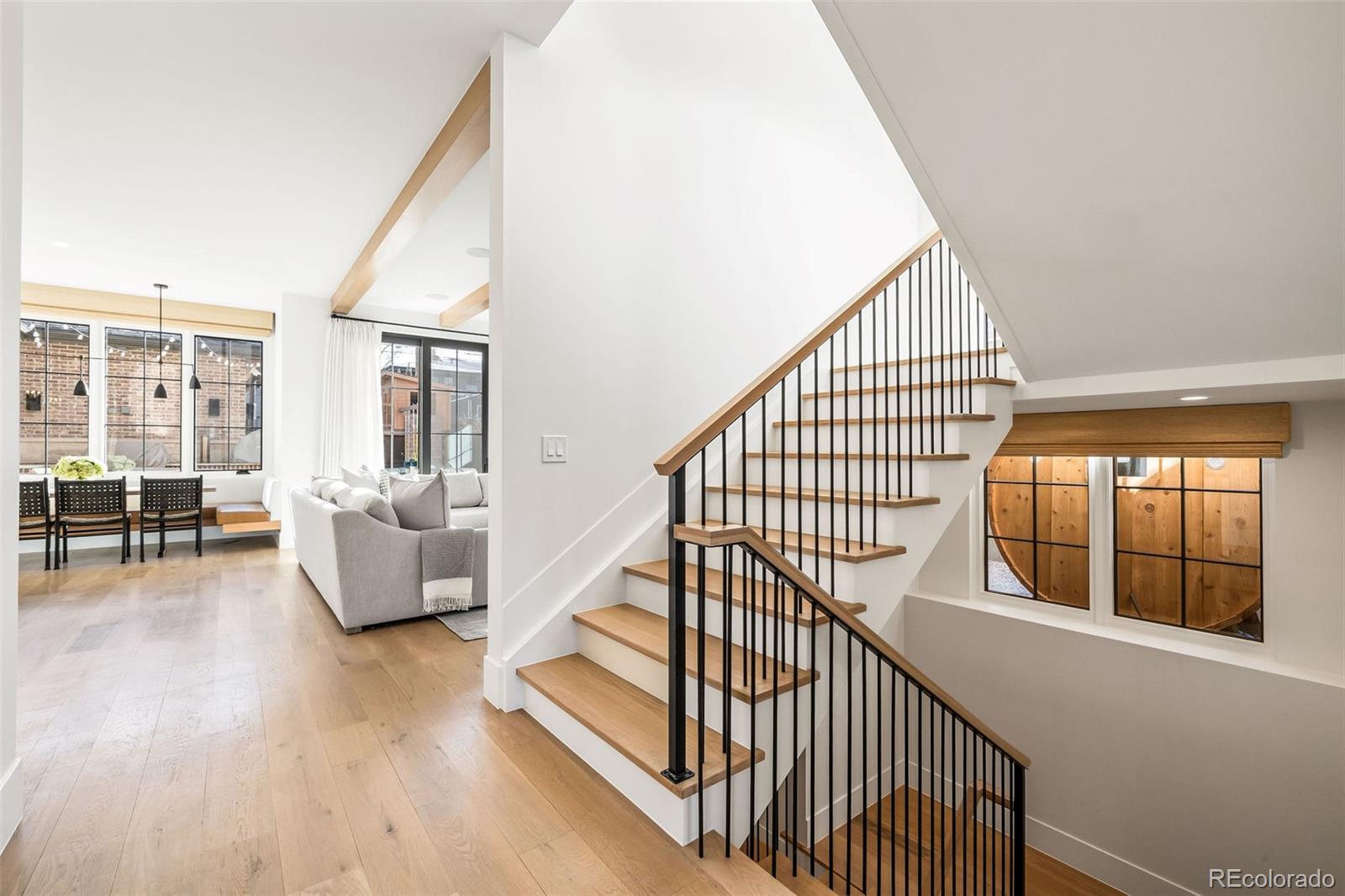 1026 South High Street Denver, CO 80209 - Photo 23 of 50 a view of livingroom with furniture and windows