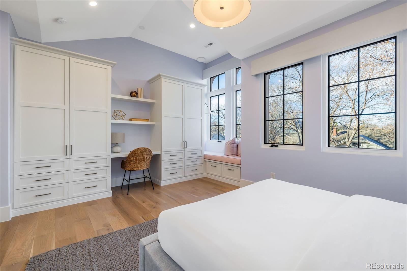 1026 South High Street Denver, CO 80209 - Photo 32 of 50 a bedroom with furniture and window