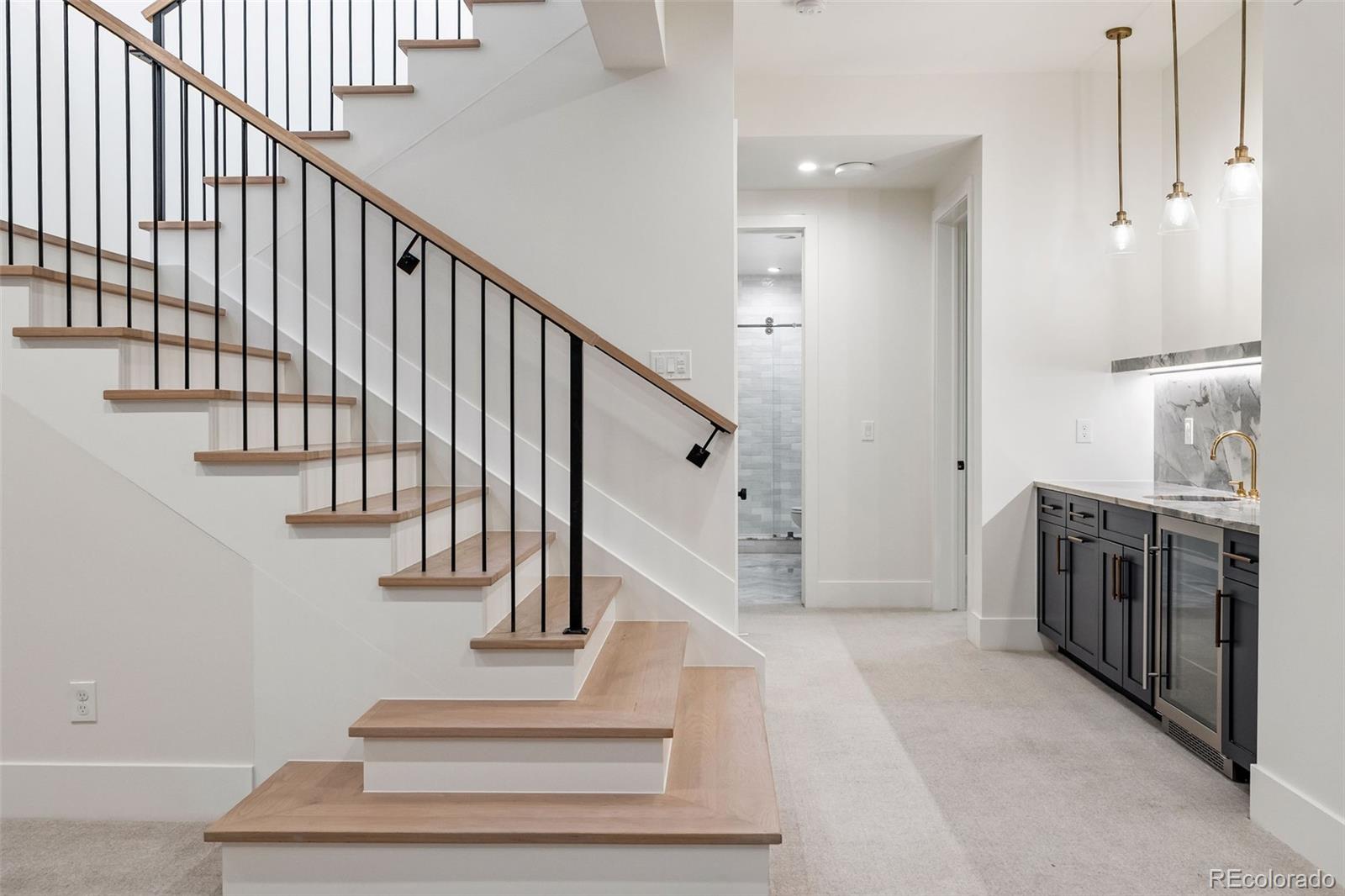 1026 South High Street Denver, CO 80209 - Photo 40 of 50 a view of entryway and hall with wooden floor