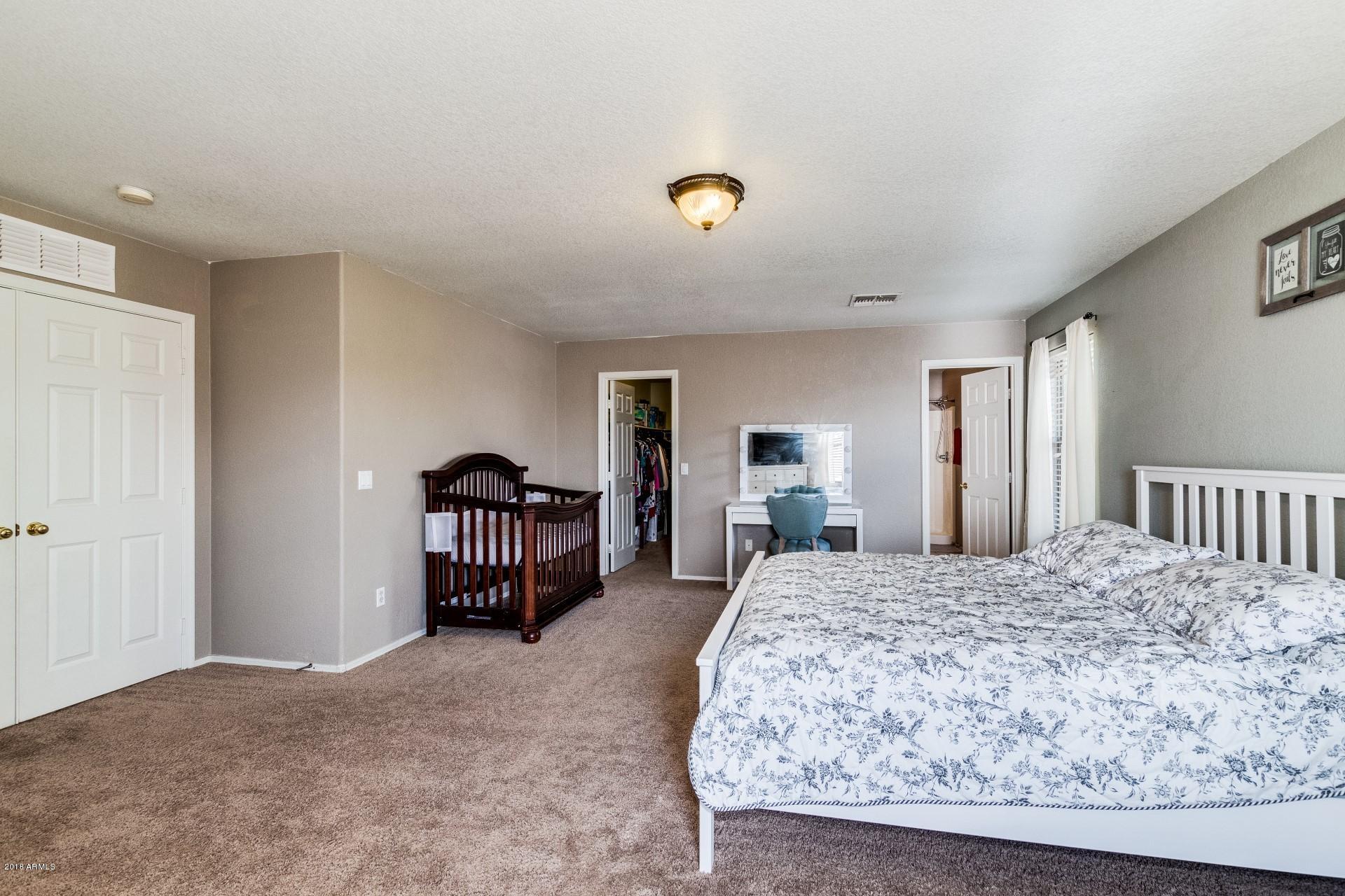 9519 West Monte Vista Road Phoenix, AZ 85037 - Photo 29 of 50 Large Master Bedroom