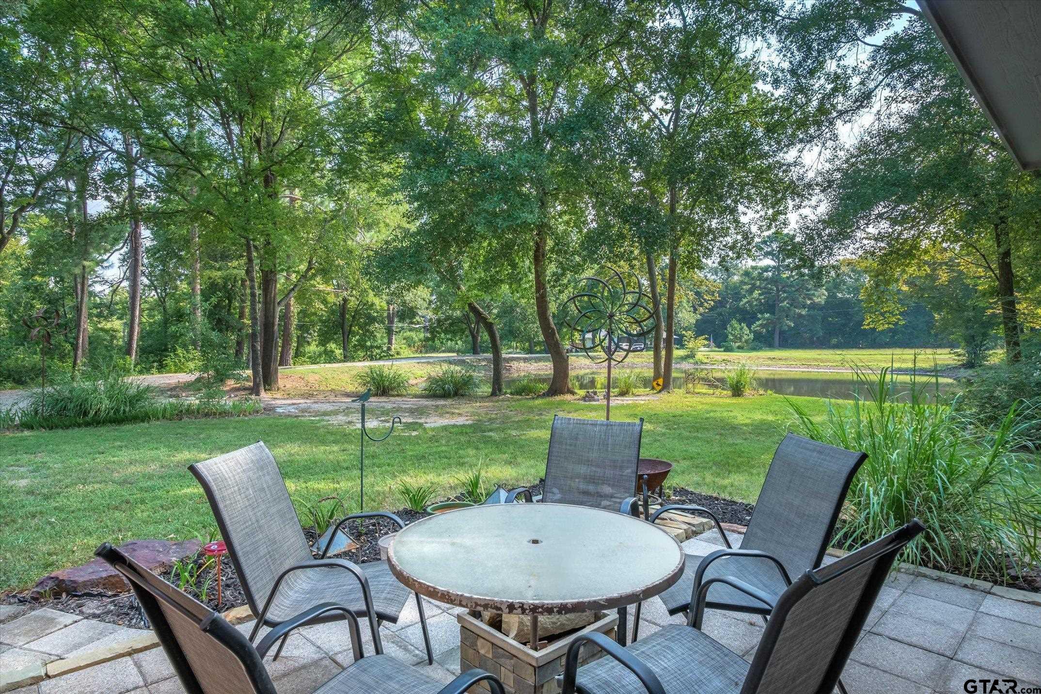 1200 Vz County Road Canton, TX 75103 - Photo 14 of 27 a view of a chair and table in the garden