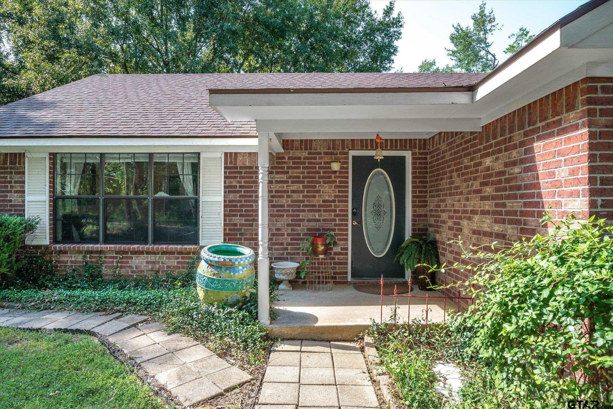 1200 Vz County Road Canton, TX 75103 - Photo 15 of 27 a front view of a house with garden