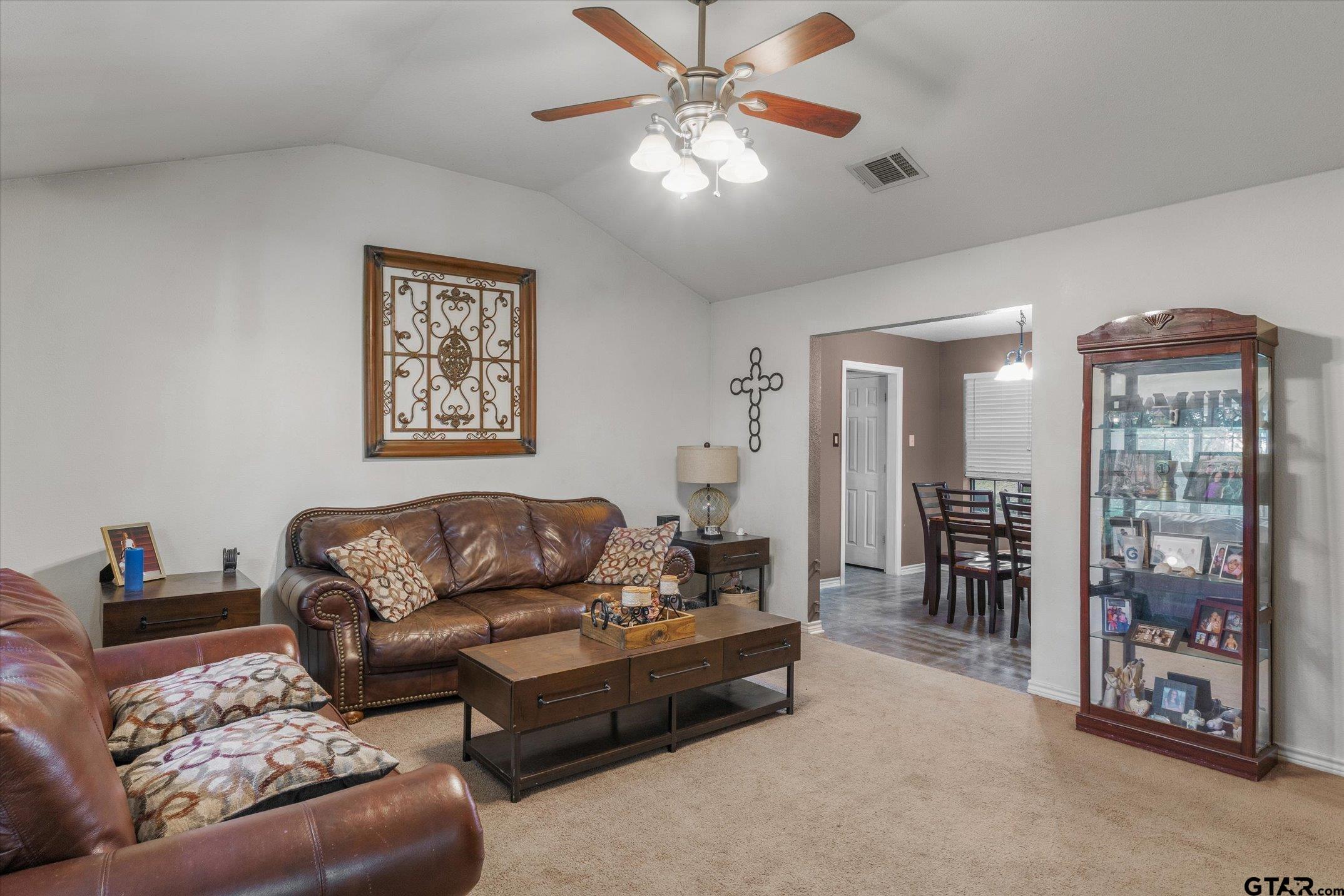 1200 Vz County Road Canton, TX 75103 - Photo 16 of 27 a living room with furniture and a chandelier