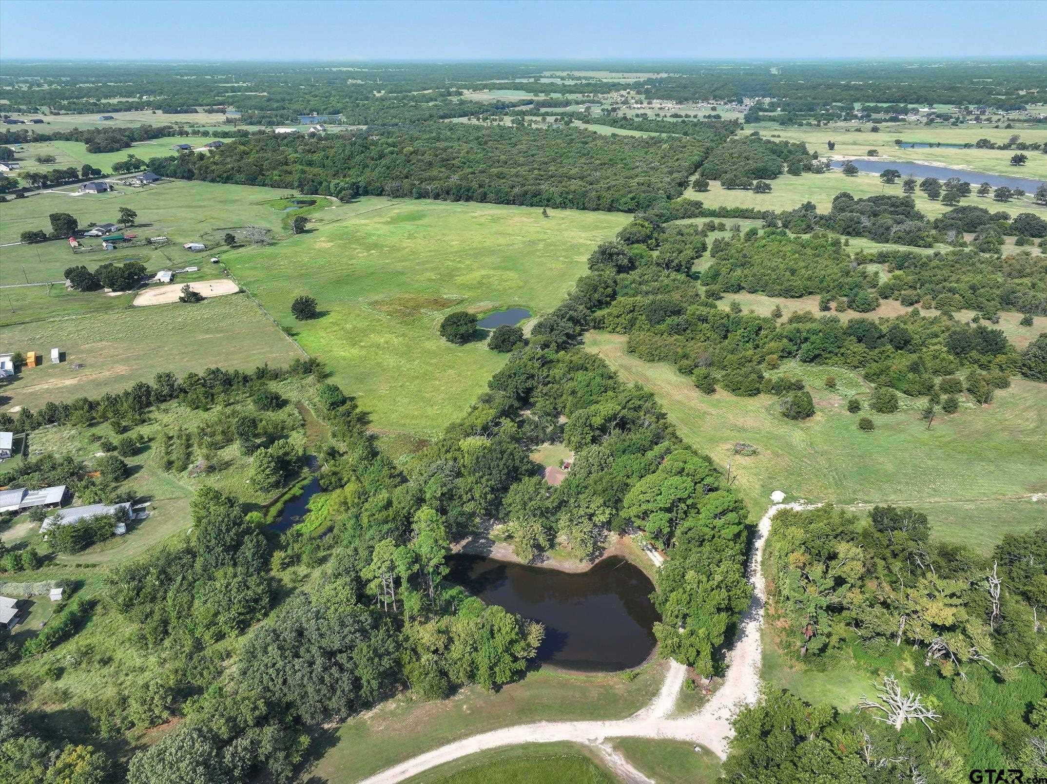 1200 Vz County Road Canton, TX 75103 - Photo 2 of 27 an aerial view of residential houses with outdoor space and trees