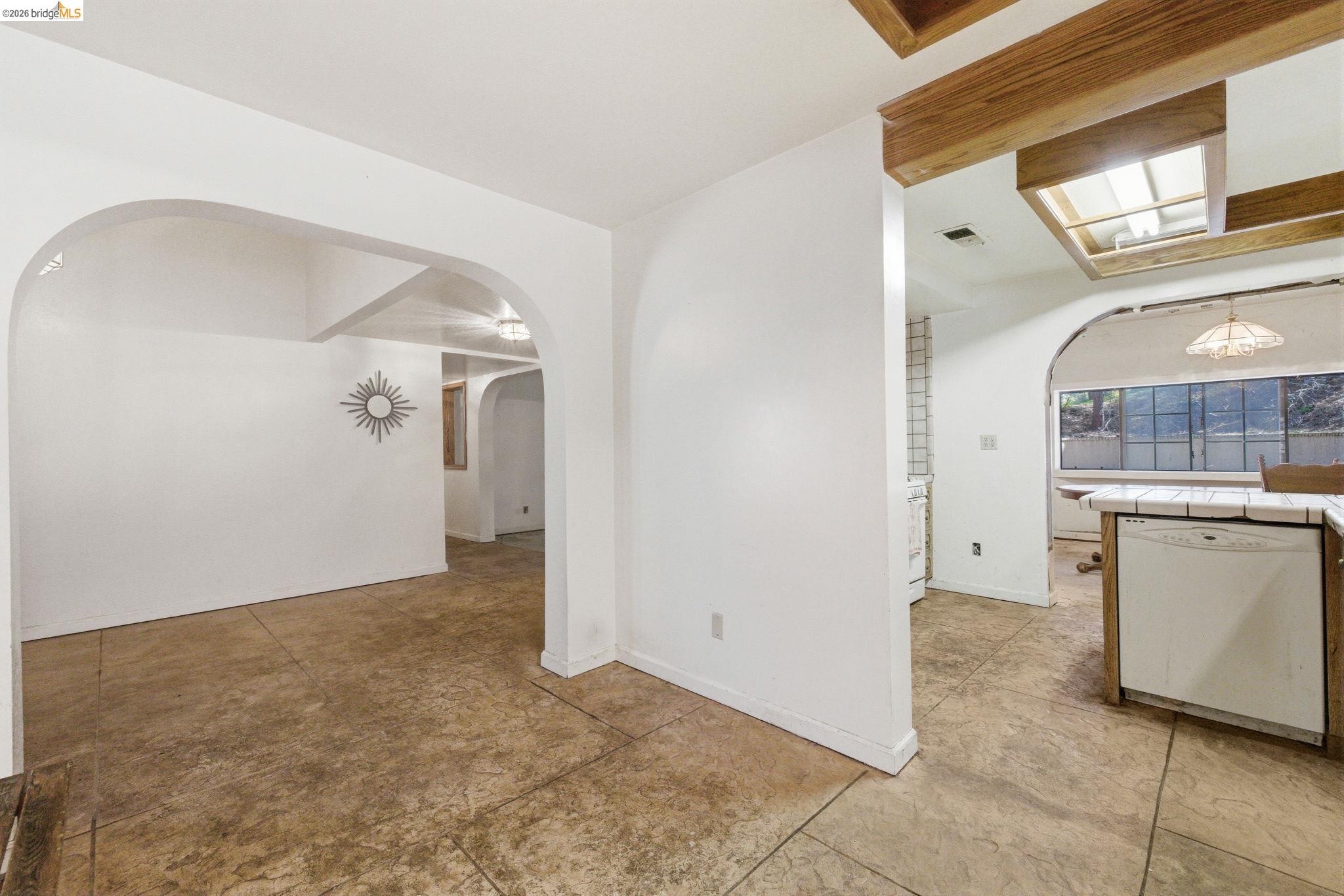 23608 Porcina Way Columbia, CA 95310 - Photo 33 of 51 Unfurnished dining area featuring arched walkways