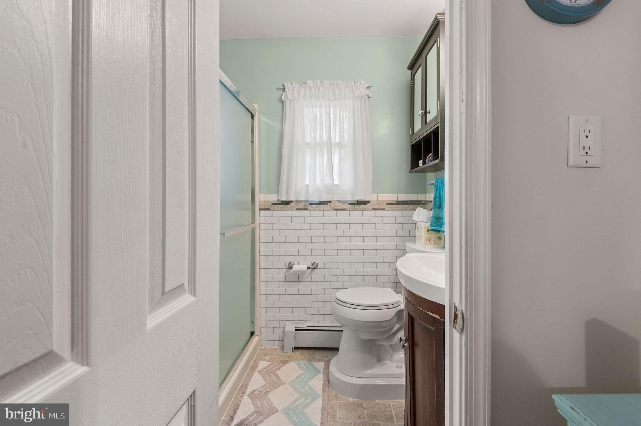 1027 Rozel Avenue Southampton, PA 18966 - Photo 11 of 24 a bathroom with a toilet and a shower