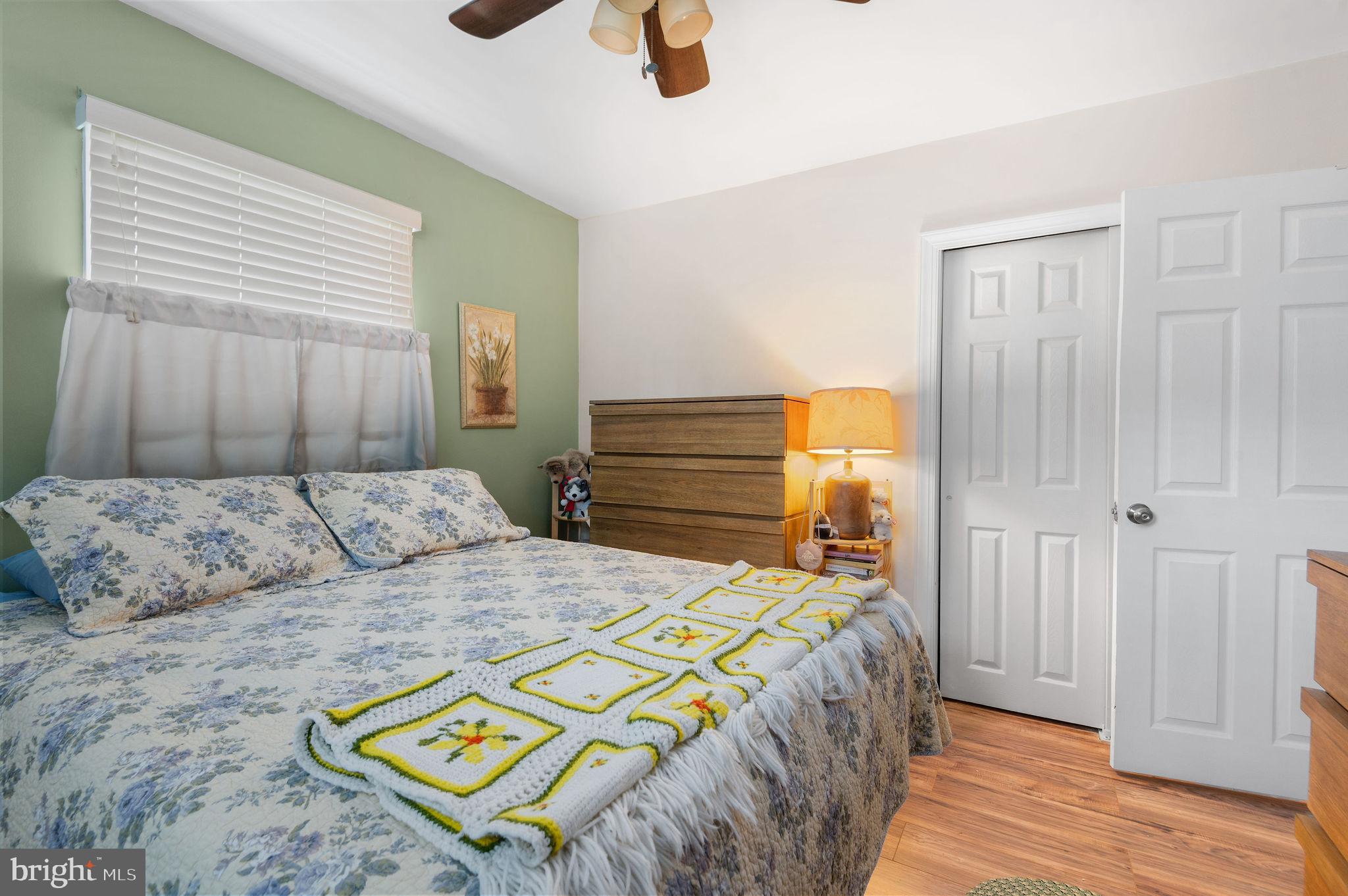 1027 Rozel Avenue Southampton, PA 18966 - Photo 13 of 24 a bedroom with a bed and a chandelier