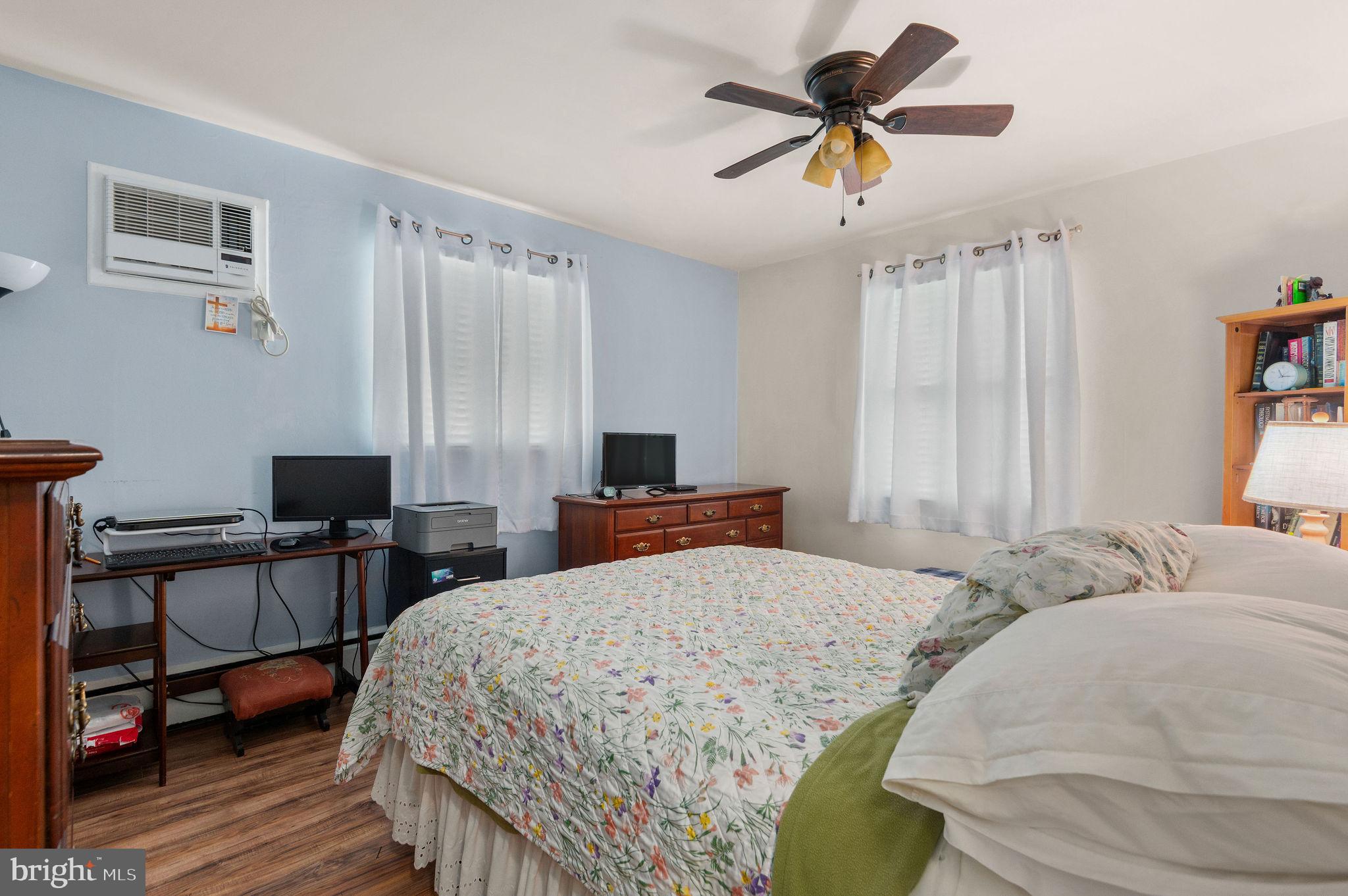 1027 Rozel Avenue Southampton, PA 18966 - Photo 14 of 24 a bedroom with a bed and a chandelier