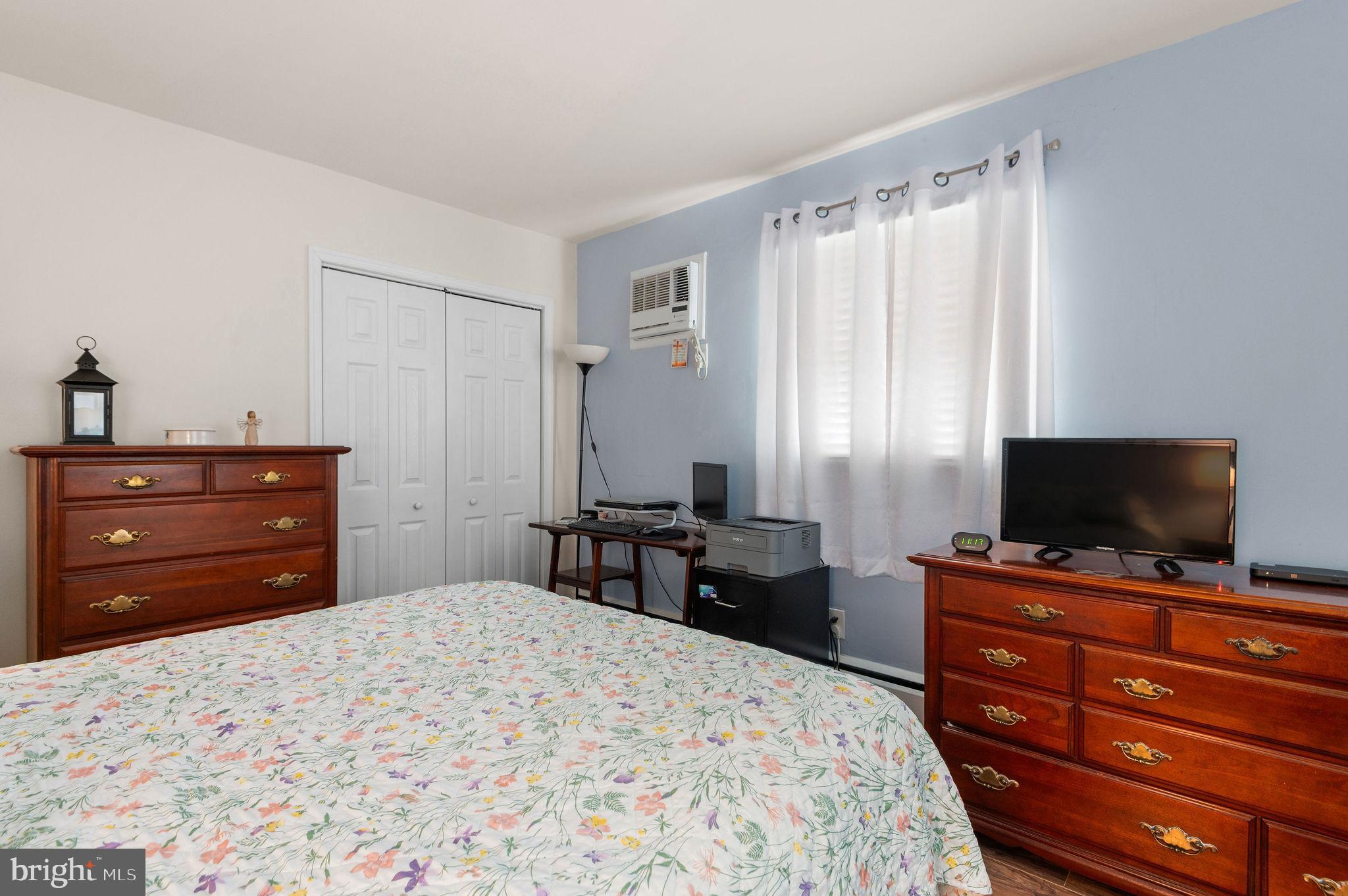 1027 Rozel Avenue Southampton, PA 18966 - Photo 15 of 24 a bedroom with a bed and a flat screen tv