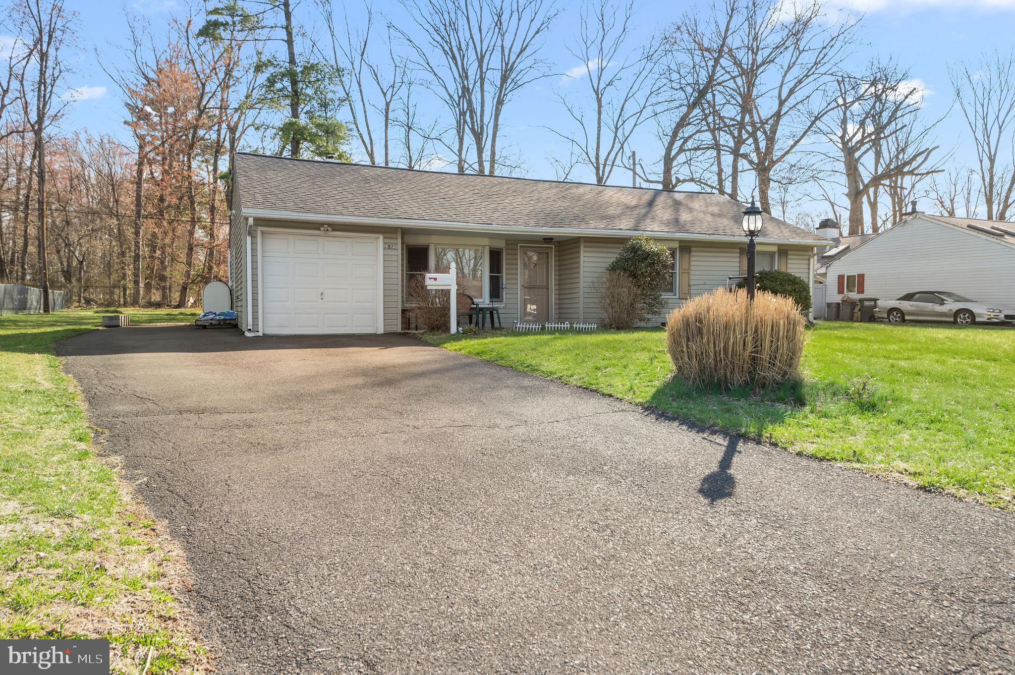 1027 Rozel Avenue Southampton, PA 18966 - Photo 19 of 24 a front view of a house with garden
