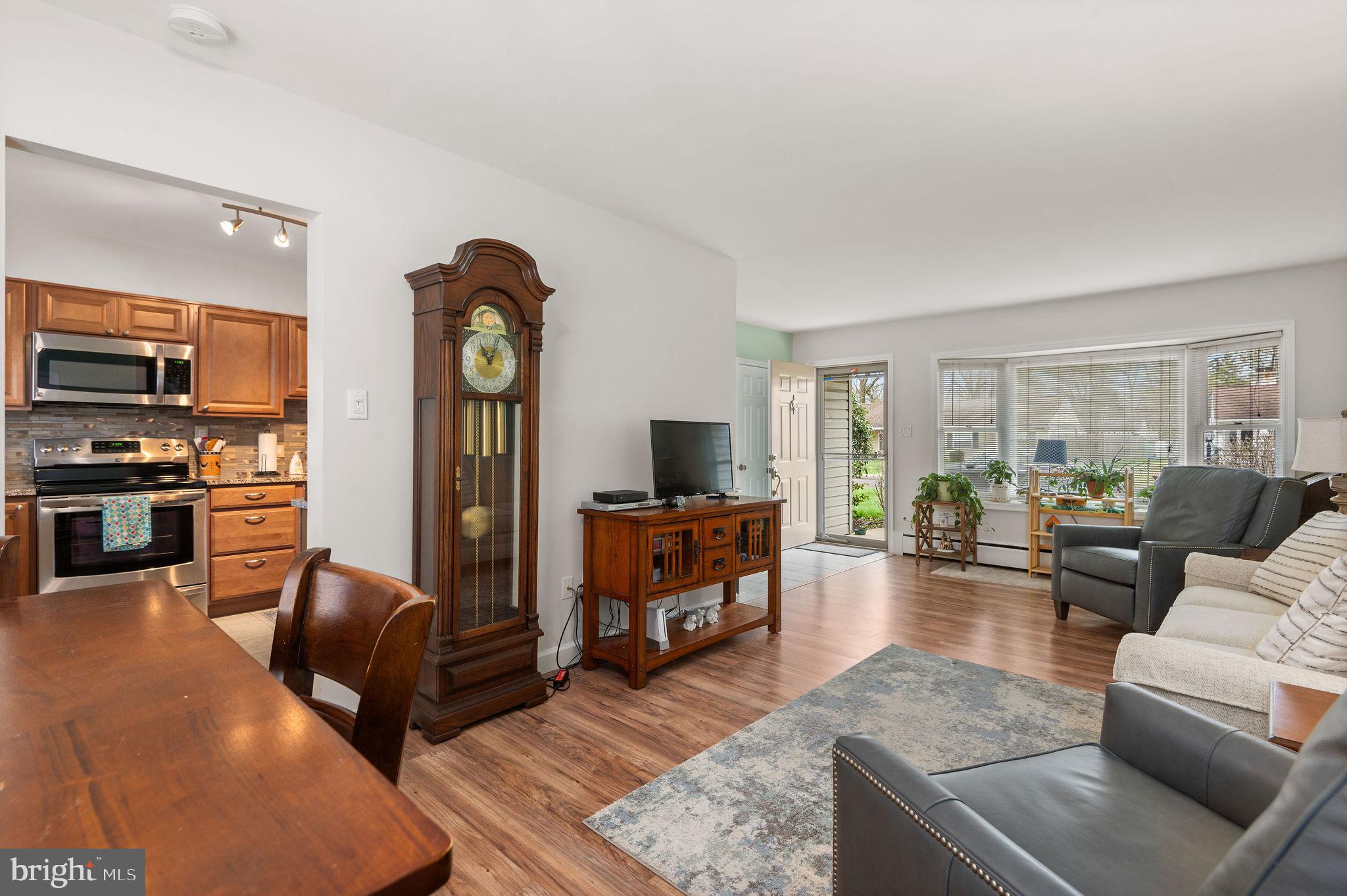 1027 Rozel Avenue Southampton, PA 18966 - Photo 6 of 24 a living room with furniture and a flat screen tv