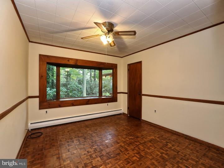 41 Robin Road Moorestown, NJ 08057 - Photo 16 of 23 a view of a livingroom with a ceiling fan and window