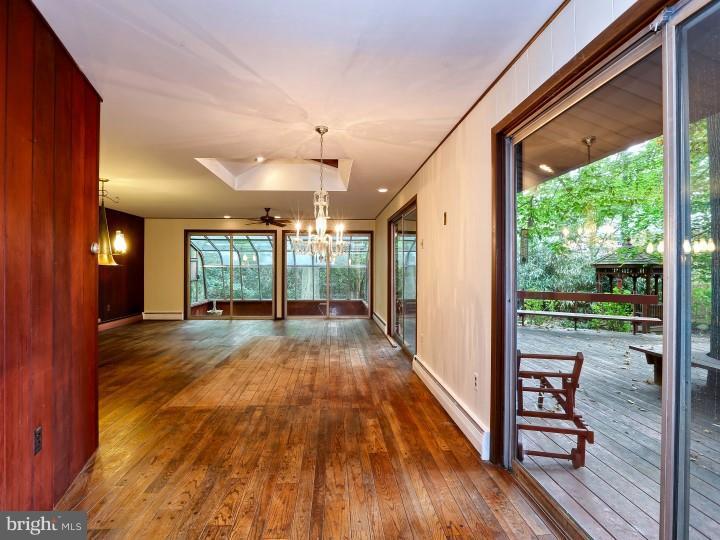 41 Robin Road Moorestown, NJ 08057 - Photo 5 of 23 a view of a porch with wooden floor and outdoor space