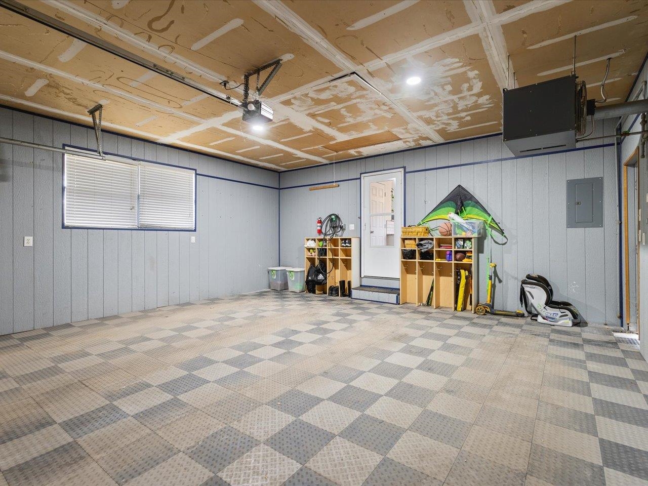 11818 Balsa Lane Roscoe, IL 61073 - Photo 33 of 44 a view of a garage with stairs